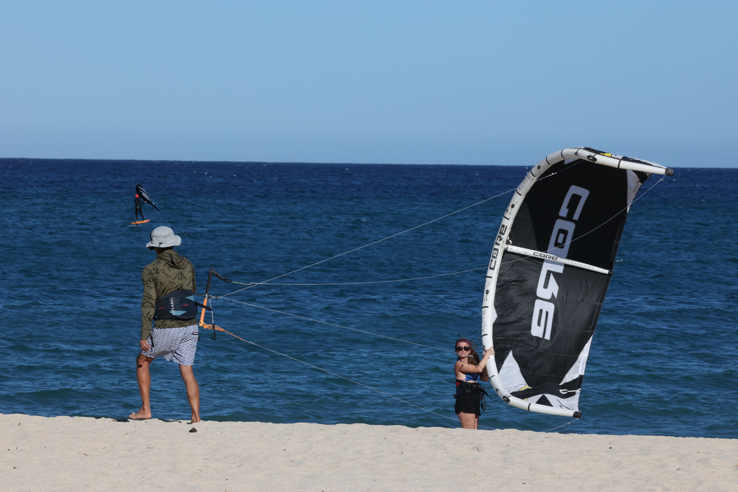 Learning kiteboarding on the beach in La Ventana